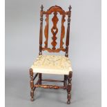 A 17th/18th Century fruitwood hall chair with shaped splat back and needlework seat, raised on