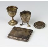 An 830 standard cigarette case, an egg cup, box and trophy 130 grams