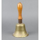 A Second World War brass and turned wood ARP hand bell base marked ARP G & J 1939, 26cm h x 13cm w