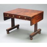 A William IV mahogany sofa table fitted 2 frieze drawers, raised on standard end supports with