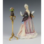 A Royal Doulton limited edition figure - The Gentle Arts Flower Arranging no.425, boxed and with