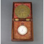 Negretti and Zambra, an aneroid barometer with silvered dial marked Negretti and Zambra London 15817