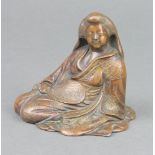 A Japanese bronze figure of a seated lady with fan 7cm x 9cm x 7cm