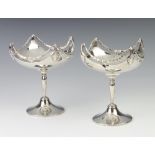 A pair of Edwardian silver tazzas with pierced swag handles London 1910, 358 grams, 13cm The