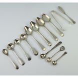 A pair of silver nips and minor silver spoons etc, mixed dates, 180 grams