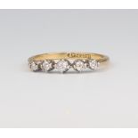 An 18ct 5 stone graduated diamond ring approx. 0.3ct, 2.2 grams, size K