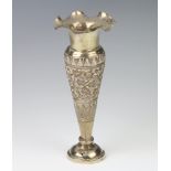 An Eastern repousse tapered white metal vase 16cm, 94 grams Holes to base