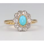 A yellow metal 18ct oval turquoise and diamond cluster ring 3.7 grams, size R 1/2The turquoise is