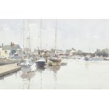 ** John Yardley born 1933, watercolour signed, harbour scene with vessels and distant buildings 31cm