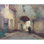 20th Century oil on canvas, indistinctly signed, figure in a Continental townscape 39cm x 49cm