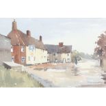 ** John Yardley born 1933, watercolour signed, village scape with pub and buildings "Rainy Day" 31cm