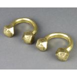 Two 18th/19th Century Nigerian gilt metal shackle bracelets 8cm x 9cm