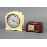 Estyma, a 1950's travelling alarm clock with square paper dial, Arabic numerals, contained in a