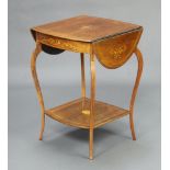 A Victorian oval inlaid rosewood drop flap 2 tier occasional table, raised on cabriole supports 67cm