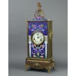 A 20th Century striking mantel clock with enamelled dial, contained in a gilt and cloisonne style