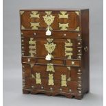 A Chinese hardwood and metal mounted cabinet with brass carrying handles to the sides, the top