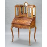 A 19th Century French inlaid rosewood bonheur du jour, the raised superstructure fitted an arch