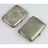 A silver engine turned cigarette case Chester 1919, 1 other 126gms gross Both are dented