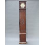 A French 19th Century comtoise clock with square gilt dial, painted Roman numerals, striking on a