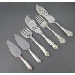 A pair of Edwardian silver plated lily pattern fish servers, a ditto and 2 cake slices