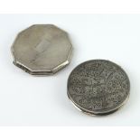 An Art Deco octagonal silver compact, a circular white metal ditto, gross weight 88gms