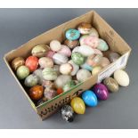 Fifty various turned hardstone eggs