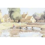 ** John Yardley born 1933, watercolour signed, village scene with figures beside a stream 29cm x 44