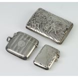 A white metal 830 repousee sleeve, depicting an inn scene, with white metal interior, two silver