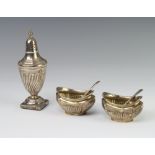 A pair of silver mustards, Birmingham 1912, a silver pepper, Sheffield 1890, two spoons, weighable