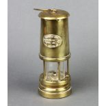 A Ferndale Coal and Mining Company brass coal miners safety lamp 21cm h x 8cm diam.