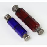 A white metal mounted red glass double ended scent bottle, 12cm, a blue ditto 10cmBoth scent bottles