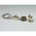 A white metal shell box, a small box the lid decorated golf clubs and golf ball, a miniature stand