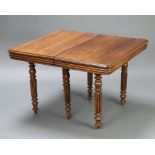 A 19th Century Continental D shaped mahogany extending dining table with 2 extra leaves, raised on 6