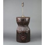 An 18th/19th Century carved African iron wood vase, converted to a lamp 36cm h x 21cm diam.