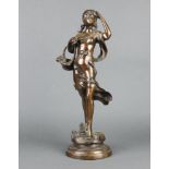 An Art Nouveau style bronze figure of a standing girl with basket raised on a circular base 43cm h x