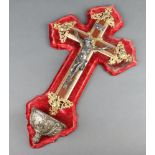 A Continental wooden and metal crucifix the base with Holy Water stoop 47cm h x 26cm