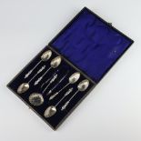 A set of 6 Victorian silver coffee spoons, nips and sifter spoon with apostle finials, Birmingham