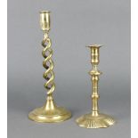 A 17th/18th Century polished brass petal candlestick with ejector 21cm x 12cm (f and r) together