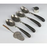 A silver circular mustard 54 grams, 5 white metal mounted horn handled servers