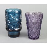 A Studio amethyst glass vase 16cm, a green glass vase 16cm