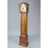 A 1930's chiming longcase clock with 19cm arched dial, silvered chapter ring and Roman numerals