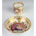 A 19th Century Derby coffee can and saucer decorated with spring flowers