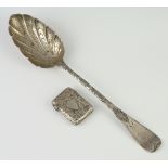 A Victorian silver berry spoon London 1854 together with a Victorian silver vesta Birmingham 1876,