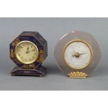 An Art Deco bedroom timepiece with gilt dial and Arabic numerals contained in an octagonal blue