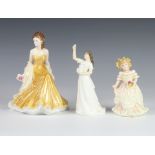 A Royal Worcester figure - Golden Wedding Anniversary 17cm, a Royal Doulton figure - Happy Christmas