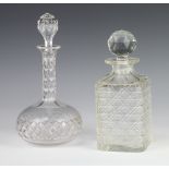 A square spirit decanter and stopper 21cm, an Edwardian mallet decanter and stopper 24cm