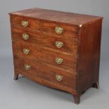 A Georgian mahogany chest of 2 short and 3 long drawers with brass plate drop handles, raised on