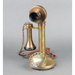 A 20th Century brass candlestick telephone 29cm h x 12cm