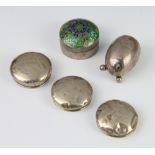 Three silver toilet jar lids, a condiment and a white metal enamelled box 36 grams gross