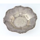 An octagonal silver bowl with shell decoration and engraved inscription Birmingham 1937, 270